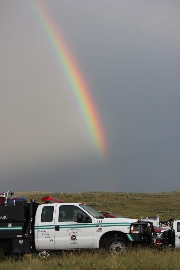 rainbow over a fire truck