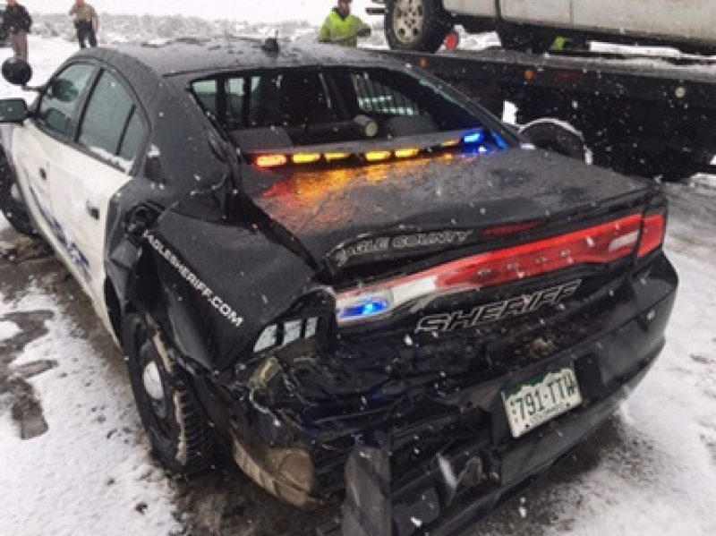 sheriff car with damage from accident